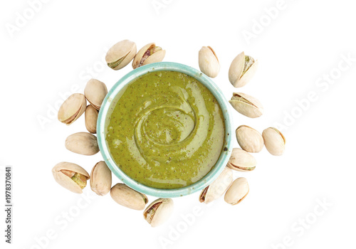 Pistachio Cream in Bowl with Pistachios Isolated on White Background