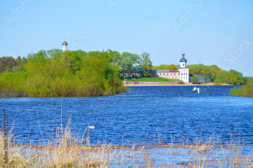 Yuriev male monastery on the Volkhov river in Veliky Novgorod, Russia. Architecture spring rustic landscape in sunny weather. Selective focus at the monastery
