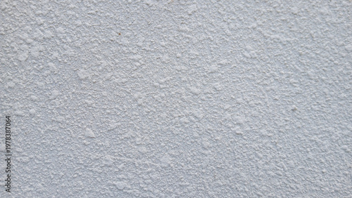 full frame background of white ceiling texture with rough acoustic spray finish for interior renovation