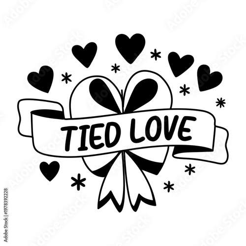 A glyph sticker of a ribbon with tied love typography 

