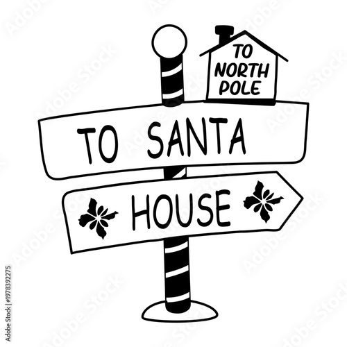 A glyph sticker of signboard with santa house text written on it 

