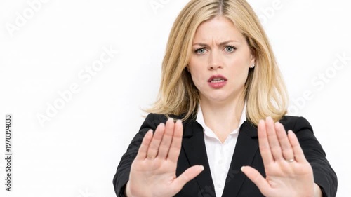 Woman expressing rejection pose over isolated white background.
