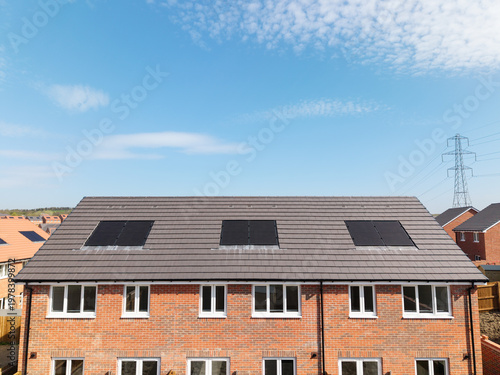 The roof of a new build house with integrated solar panels