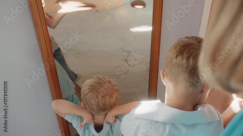 Children mimic superheroes at park. Kids strike superhero poses while family enjoys leisure time. Children confidently imitate superheroes in playful moments during family day outdoors