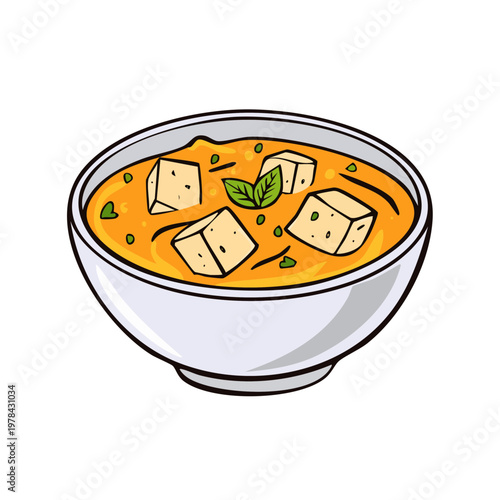 Bowl of Delicious Indian Curry with Paneer Cubes and Fresh Mint Garnish