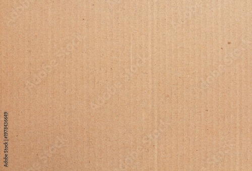 Cardboard sheet texture background, detail of recycle brown paper box pattern.