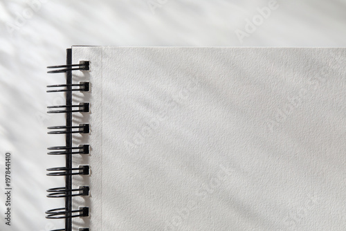 Close-up of open  spiral notebook