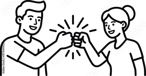 A man and woman bump fists in a celebratory gesture of friendship and teamwork