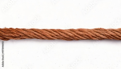 Close-up of a twisted brown rope on white background.