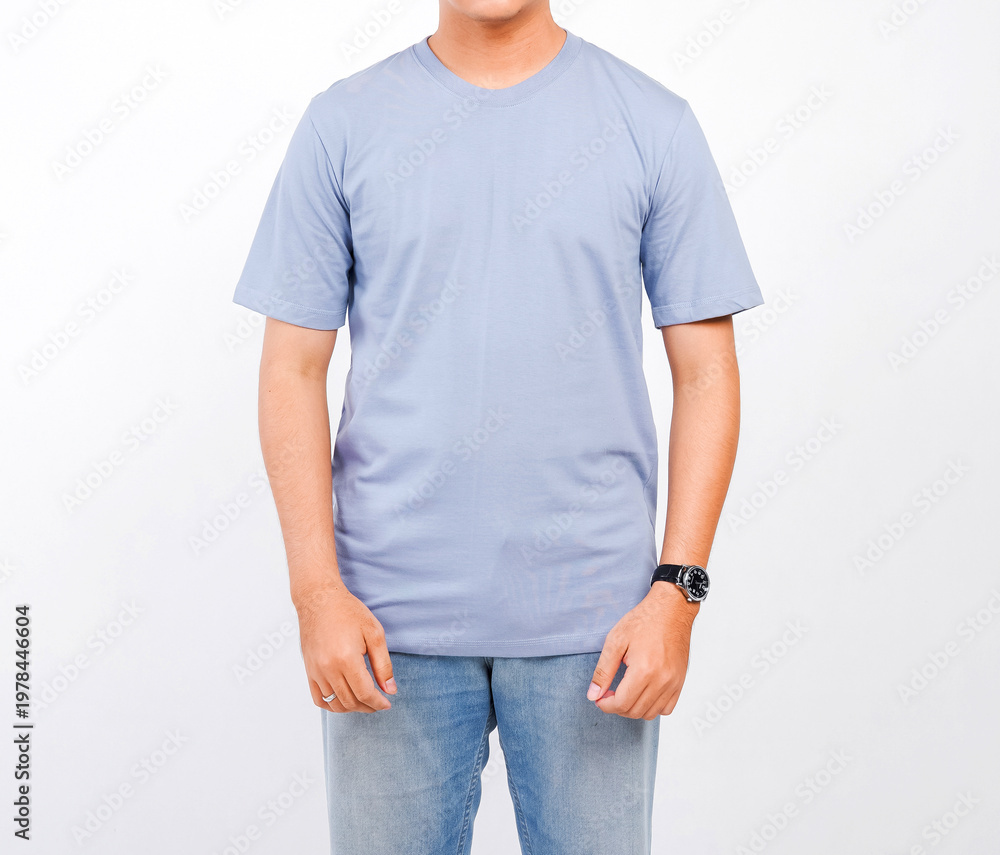 Obraz premium Male body wearing a plain grey blue t-shirt and blue jeans, with a white background