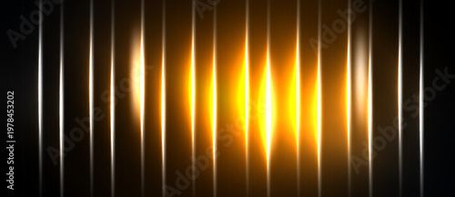 Bright golden lines radiate from center. Dark background creates dramatic visual effect. Vertical illumination emphasizes depth.