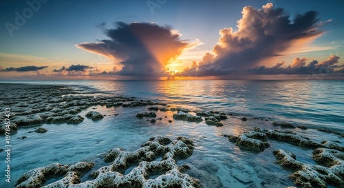 Ocean sunset with dramatic cloud formations and golden sunlight horizon view