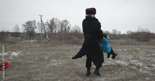 Man and kid boy go for walk. Dad and son play outside. 4K 10-bit