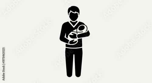 Man holding a baby close.