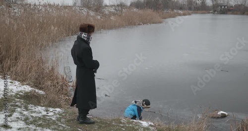 Man and kid boy go for walk. Dad and son play outside. 4K 10-bit