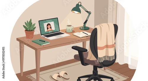 Cozy home office setup with laptop and comfortable chair.