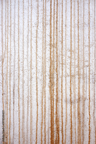 White dirty wall with vertical pattern.