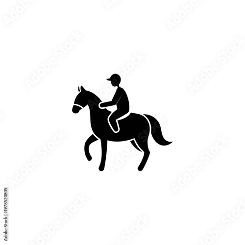 Equestrian rider in traditional attire galloping on a spirited horse