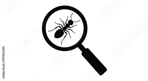 A magnifying glass focuses on a detailed black silhouette of an ant