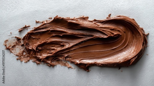 Creamy chocolate spread lies flat, seen from above.