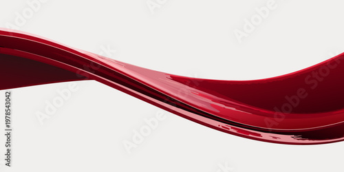 A flowing glossy red ribbon against a neutral background
