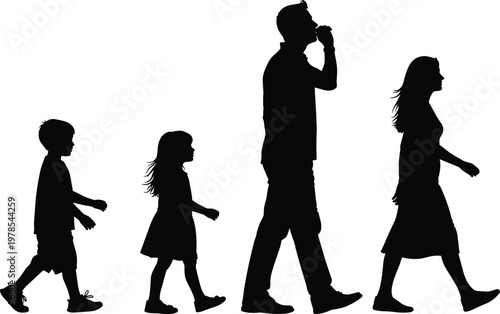 Silhouette of a family walking together featuring a young boy and girl followed by a man and a woman outdoors