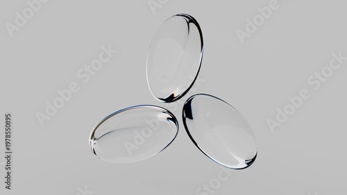 Oval shapes move and change positions over a simple background