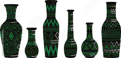 Ornate ceramic vases collection with traditional green tribal patterns and geometric decorations for classic home interior.