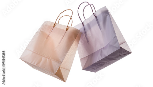 Foto Two paper shopping bags one brown and one purple, isolated on transparent backgr