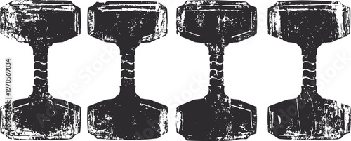 Set of four black dumbbells with textured surfaces arranged in a row for fitness and strength training