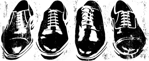 Four classic black leather men's dress shoes with laces lined up side by side