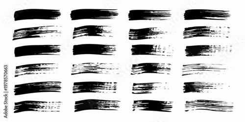Collection of abstract black brush strokes arranged in a grid pattern