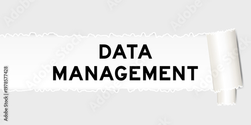 Ripped gray paper background that have word data management under torn part