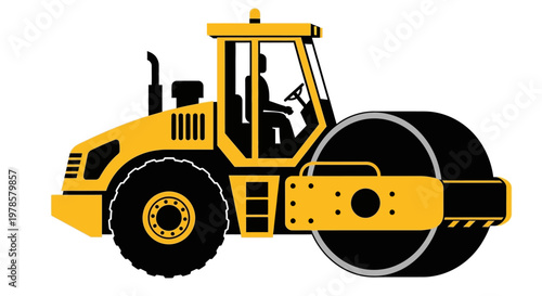 A yellow road roller is parked on a flat surface in an industrial setting with a large drum and wheels prominently displayed.