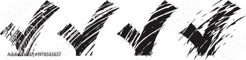 set of four black grunge check marks with rough, textured brush strokes
