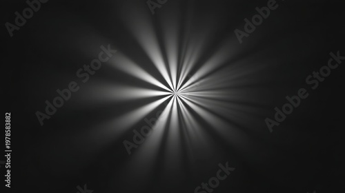 Rays of Light Emanating from a Central Point on a Black and White Background with a Soft Gradient Effect