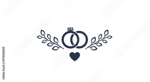 Black wedding rings and heart symbol.