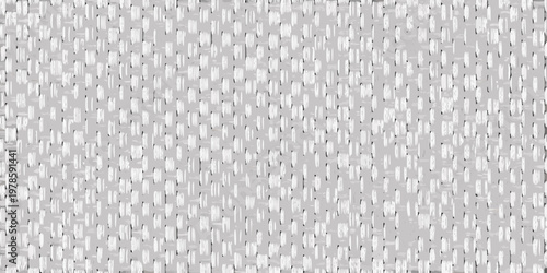 Close up of a tightly woven light gray and white textured fabric