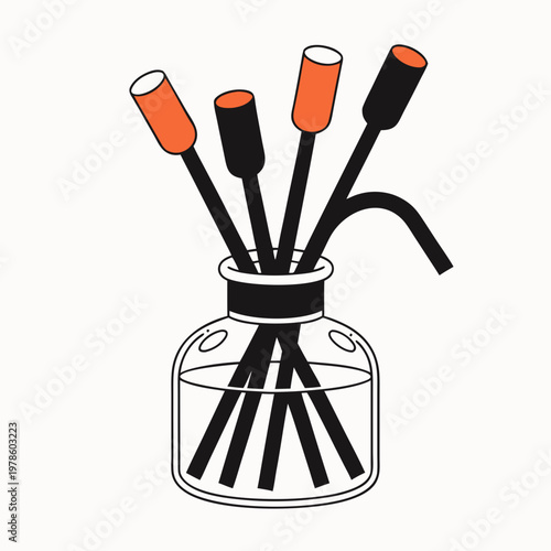 Simple diffuser reed sticks in a glass bottle.