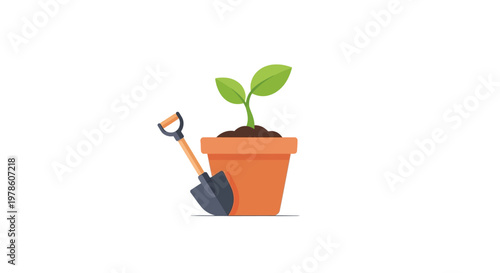 Small green plant in pot with shovel.