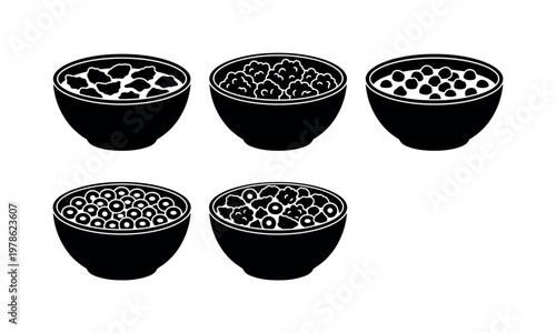 Cereal bowls filled with flakes and milk, bowl with granola clusters, bowl with chocolate cereal pieces, bowl with ring cereal