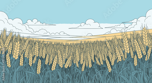 A serene winter wheat field rests beneath towering mountains in a rural nature landscape where the blue sky and clouds meet the peaceful countryside