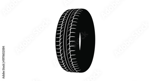 A black car tire with a detailed tread pattern against a white background
