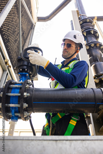 Industrial Technician Repairing Pipeline Valve System