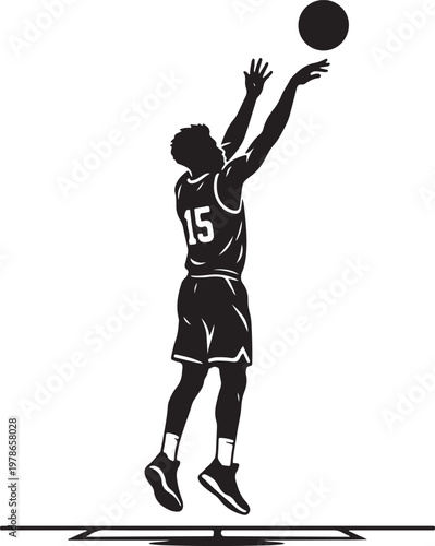 Young basketball player jumping to shoot ball in high contrast silhouette