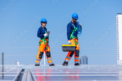 Solar Technicians Installing Rooftop Photovoltaic Panels