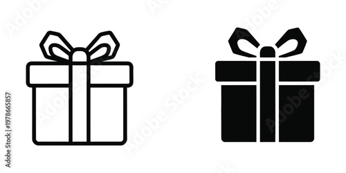 Contrast of a light and dark gift box with decorative ribbons on a plain background