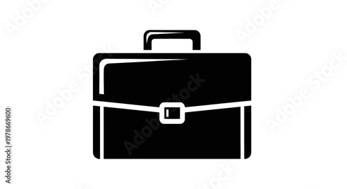 A sleek briefcase sits closed on a surface in a business environment with a handle up and shiny metal buckle.