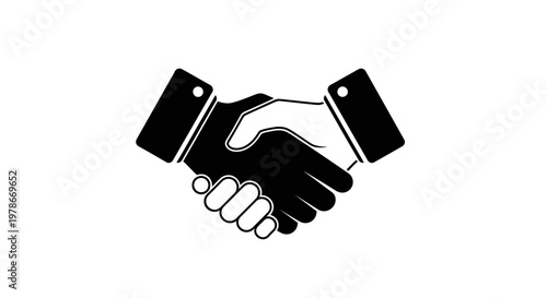 Two businesspeople shaking hands in a formal agreement at a meeting