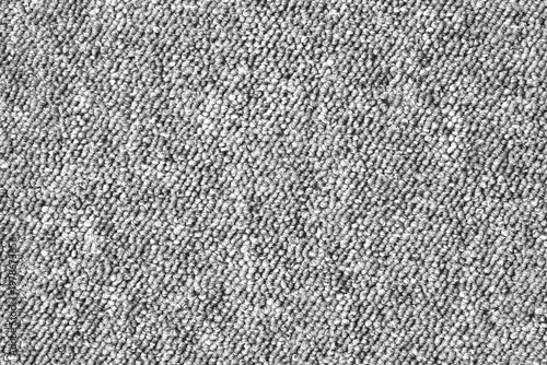 Gray loop‑pile carpet texture with dense woven fibers, ideal for interior design references, fabric backgrounds, and material detail projects.